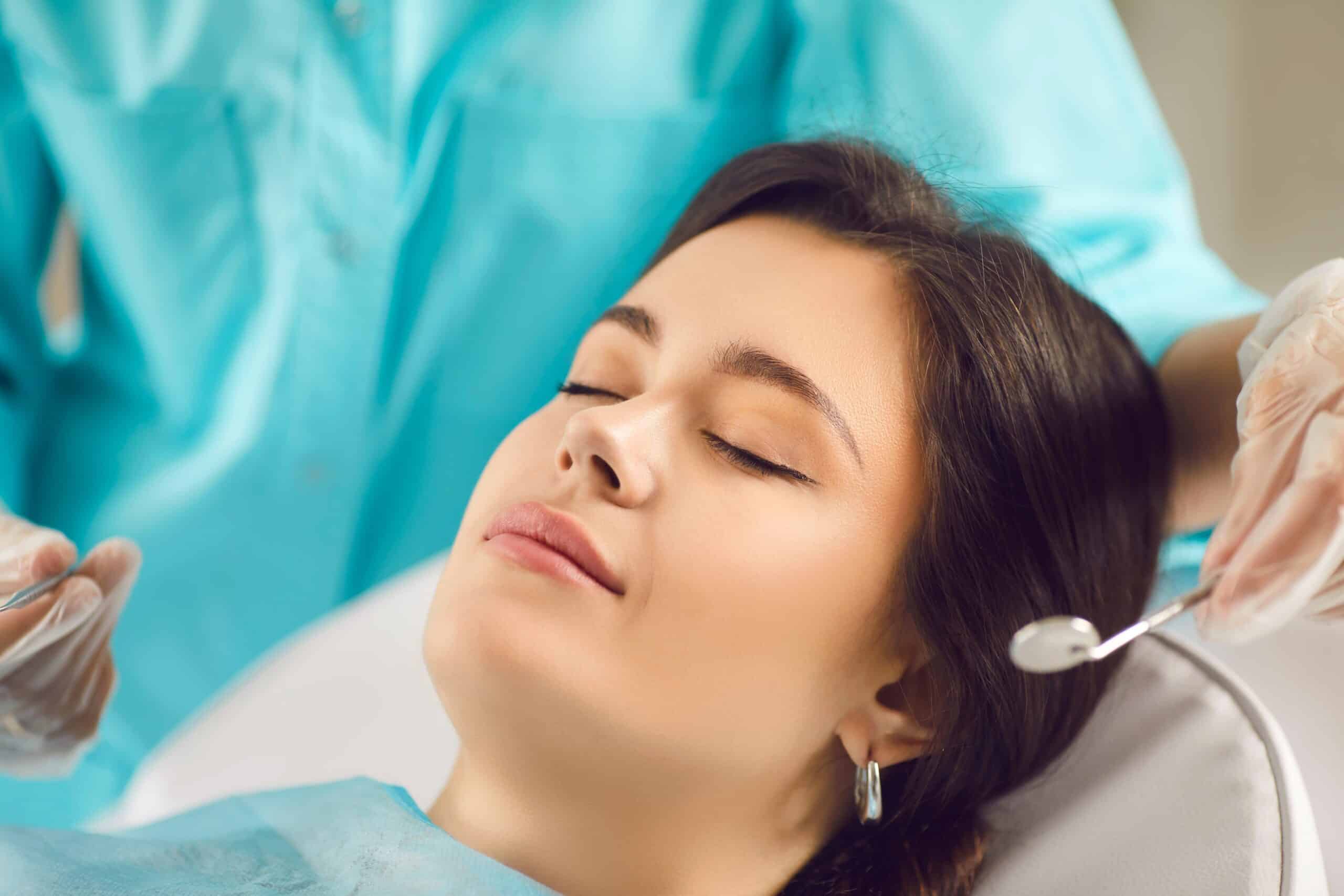 Beautiful,Young,Woman,Closed,Her,Eyes,In,The,Dentists,Chair,