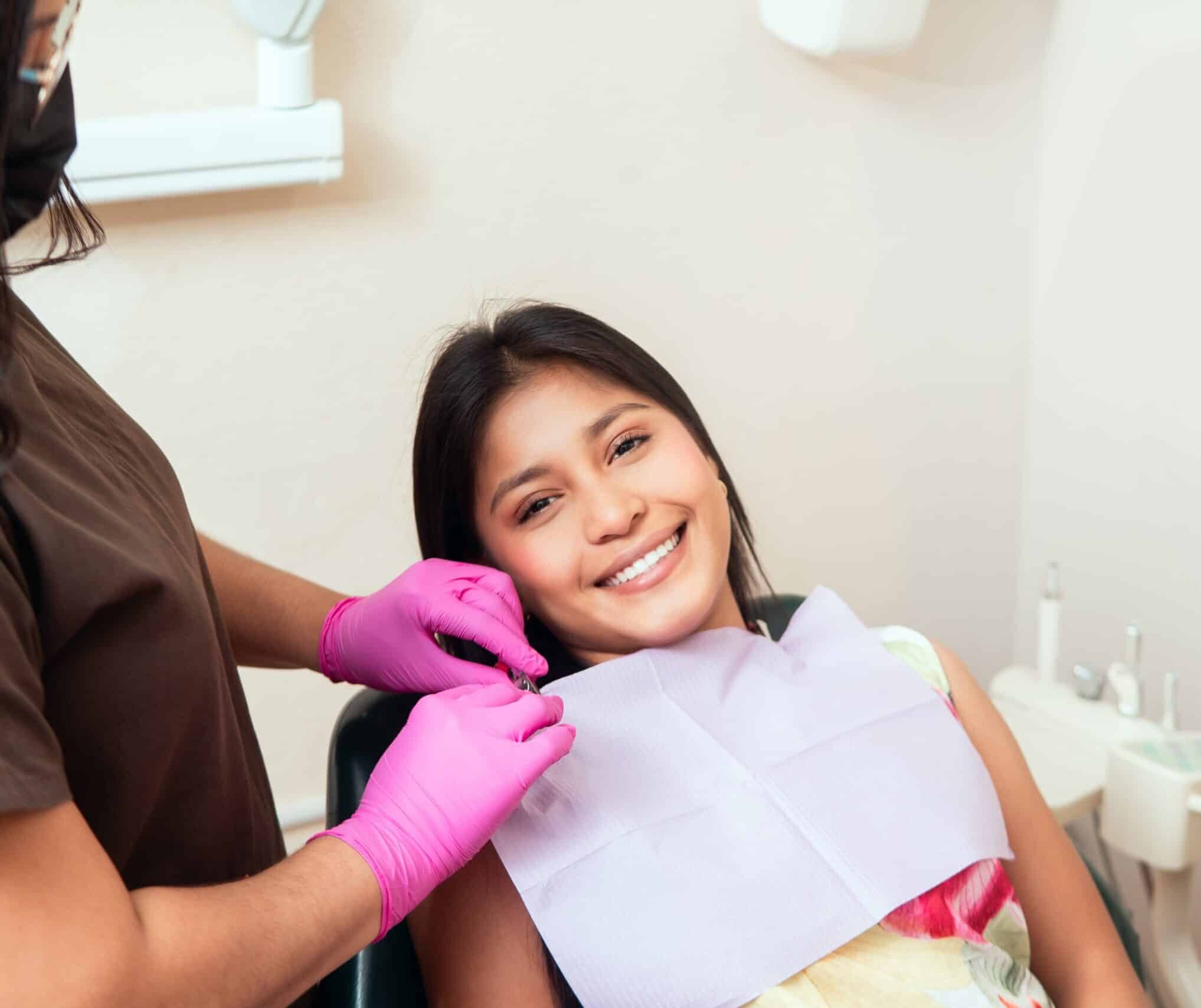 Patient,Smiling,In,A,Dental,Chair,Getting,Ready,For,Oral
