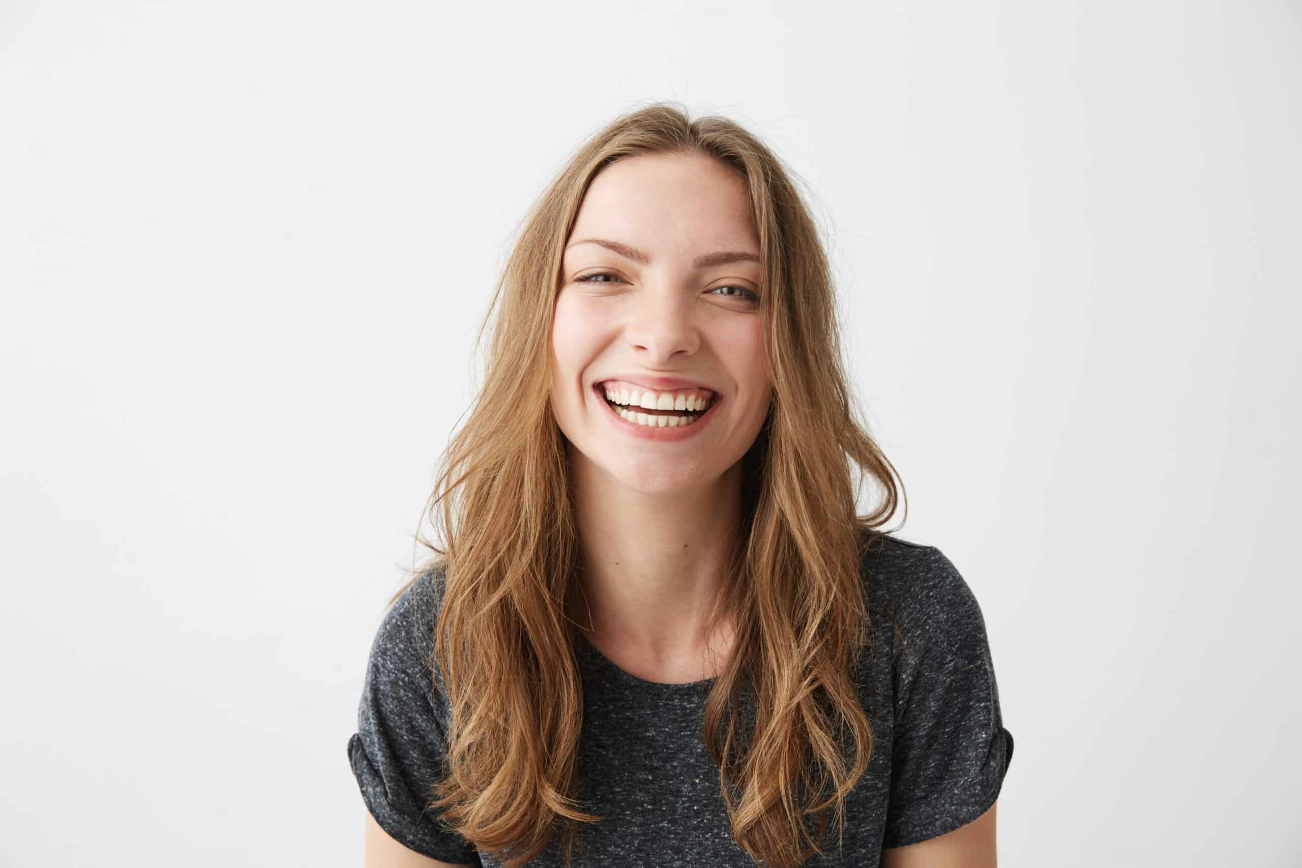 Young,Cheerful,Happy,Girl,Smiling,Laughing,Looking,At,Camera,Over